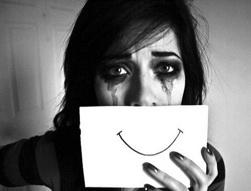 mulher_depressao_sorriso_choro